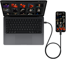 USB-C ile iPhone 15 Pro Max’e bağlanmış bir 14 inç MacBook Pro görseli